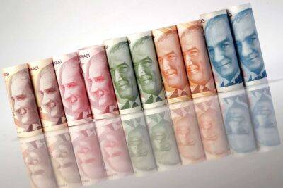 Тайип Эрдоган - Турецкая лира достигла рекордно низкого уровня после резкого снижения процентной ставки - kiprinform.com - Турция - Сша