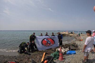 Ксения Лоизиду - Волонтеры собрали на пляже Дасуди за полчаса 680 кг мусора - cyprusbutterfly.com.cy - Кипр - Франция